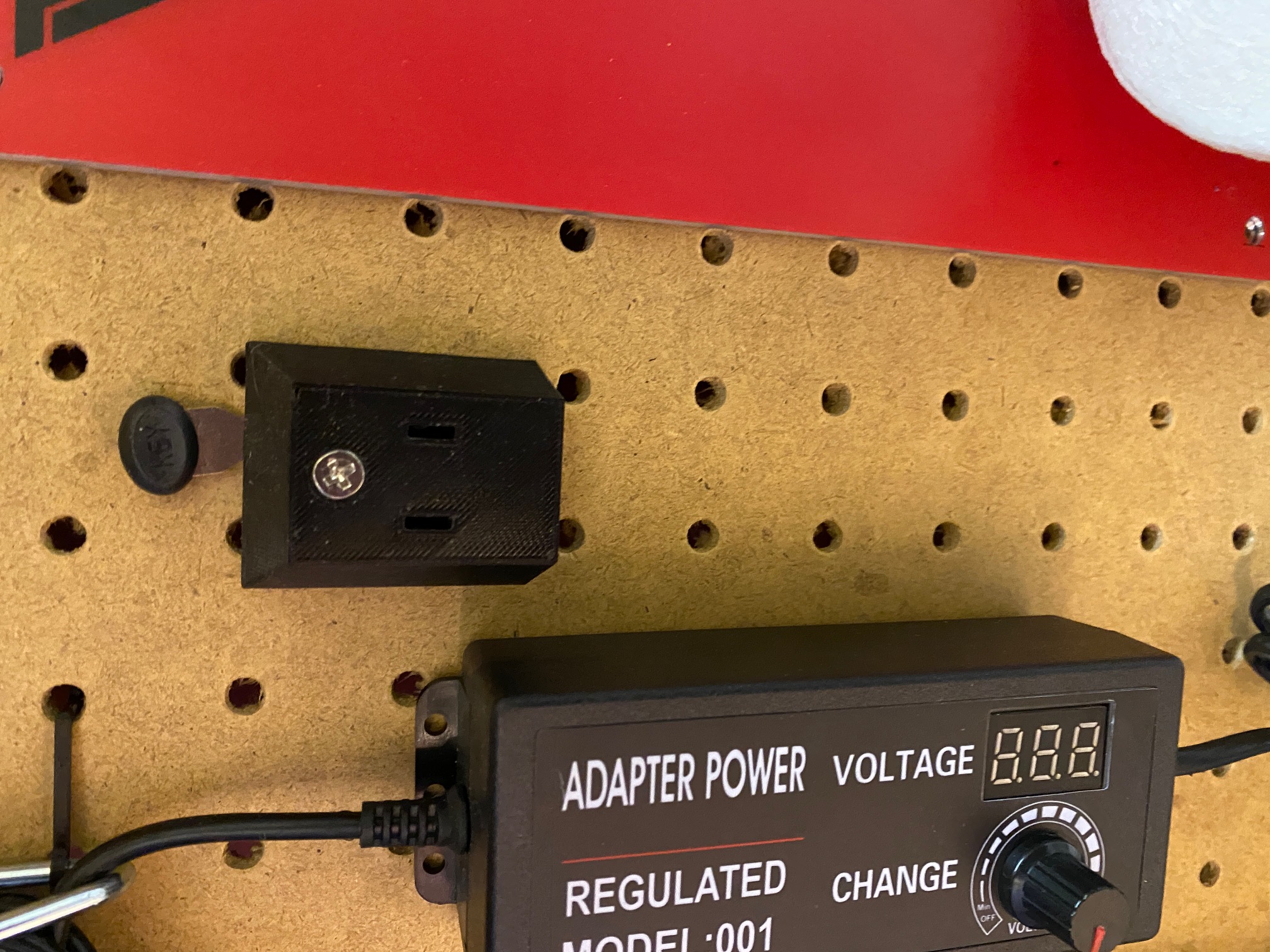 Single AC adapter wall mount storage by Asus1357 Download free STL