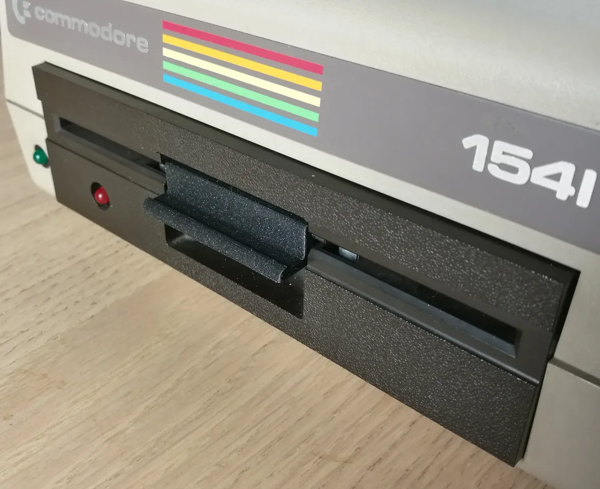 Commodore 1541 ALPS drive door latch replacement by InsaneDruid