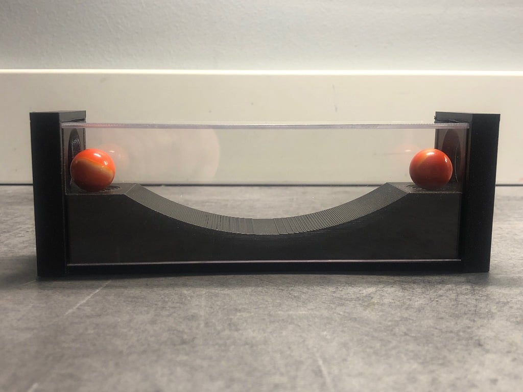 Two marbles puzzle (acrylic plate version)