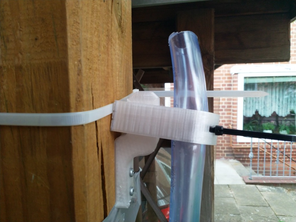 Rain barrel hose holder