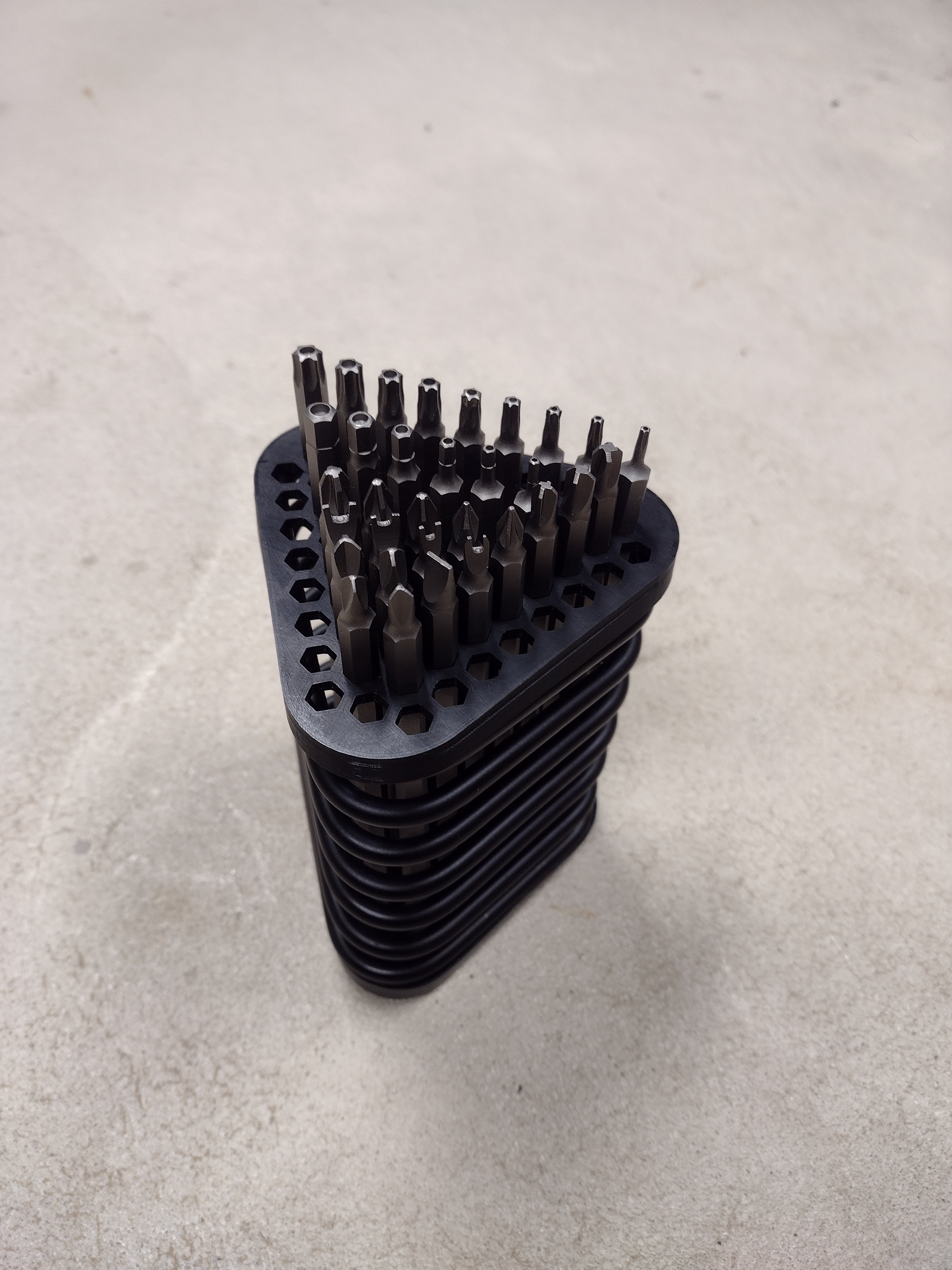 Spring desk thing bit holder