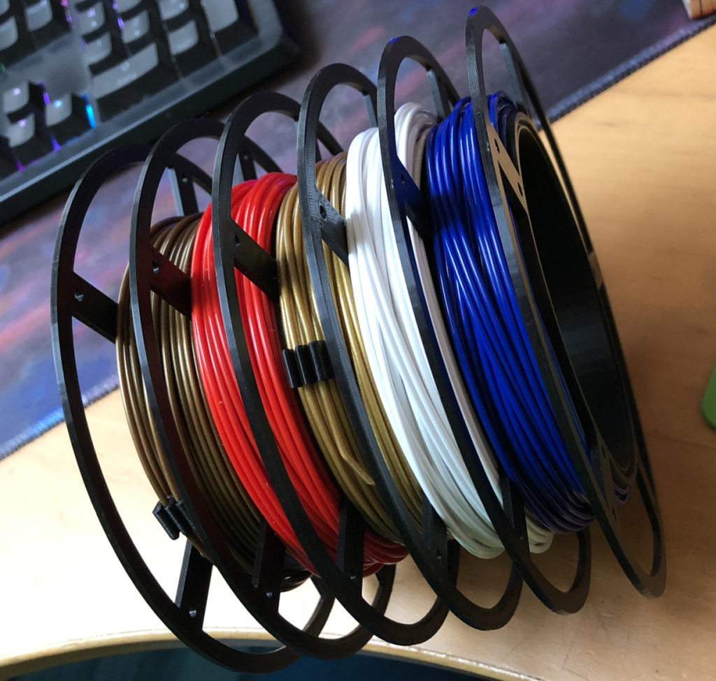 Expandable Loose Filament Spool With Holes For Skate bearing roller Expandable Loose Filament Spool With Holes For Skate bearing roller