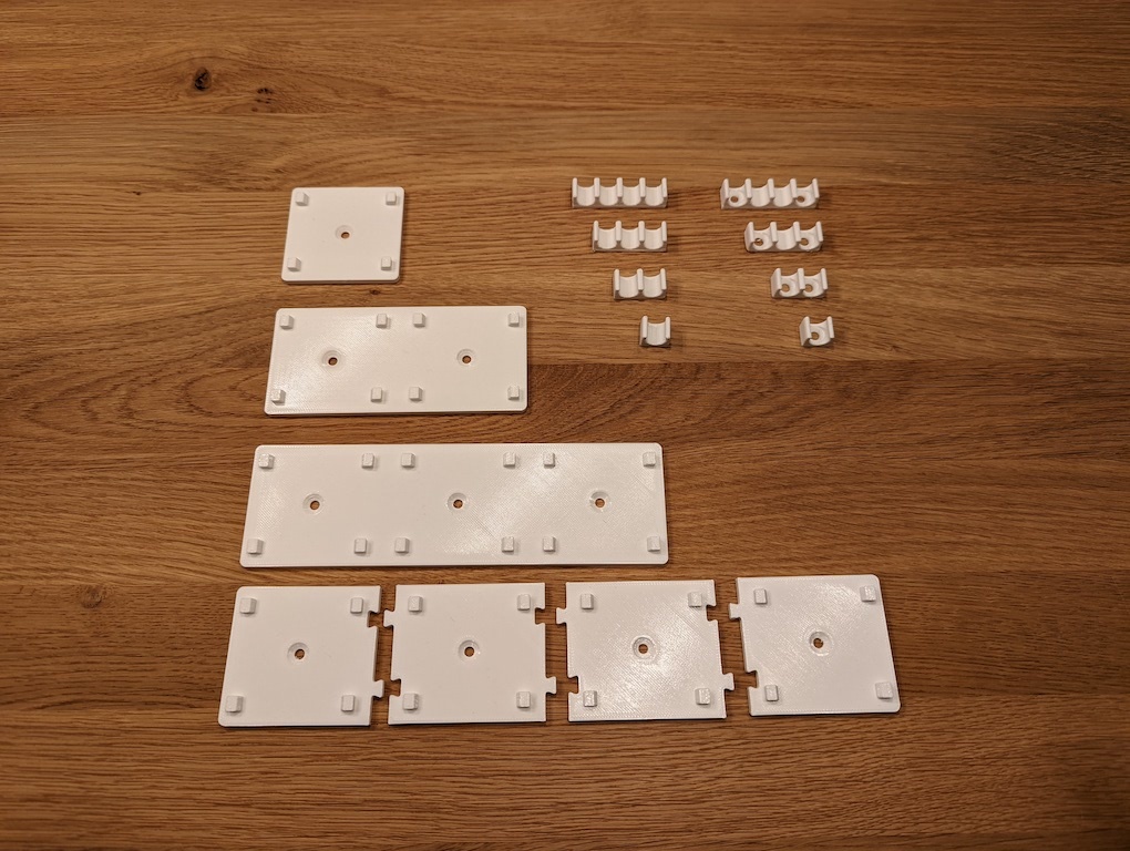 Wall mounts and cable clips for IKEA ÅSKVÄDER