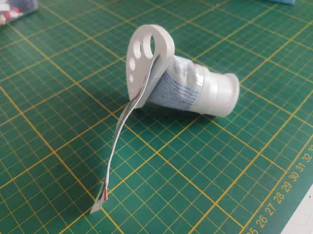 Toothpaste squeezer - narrow hole