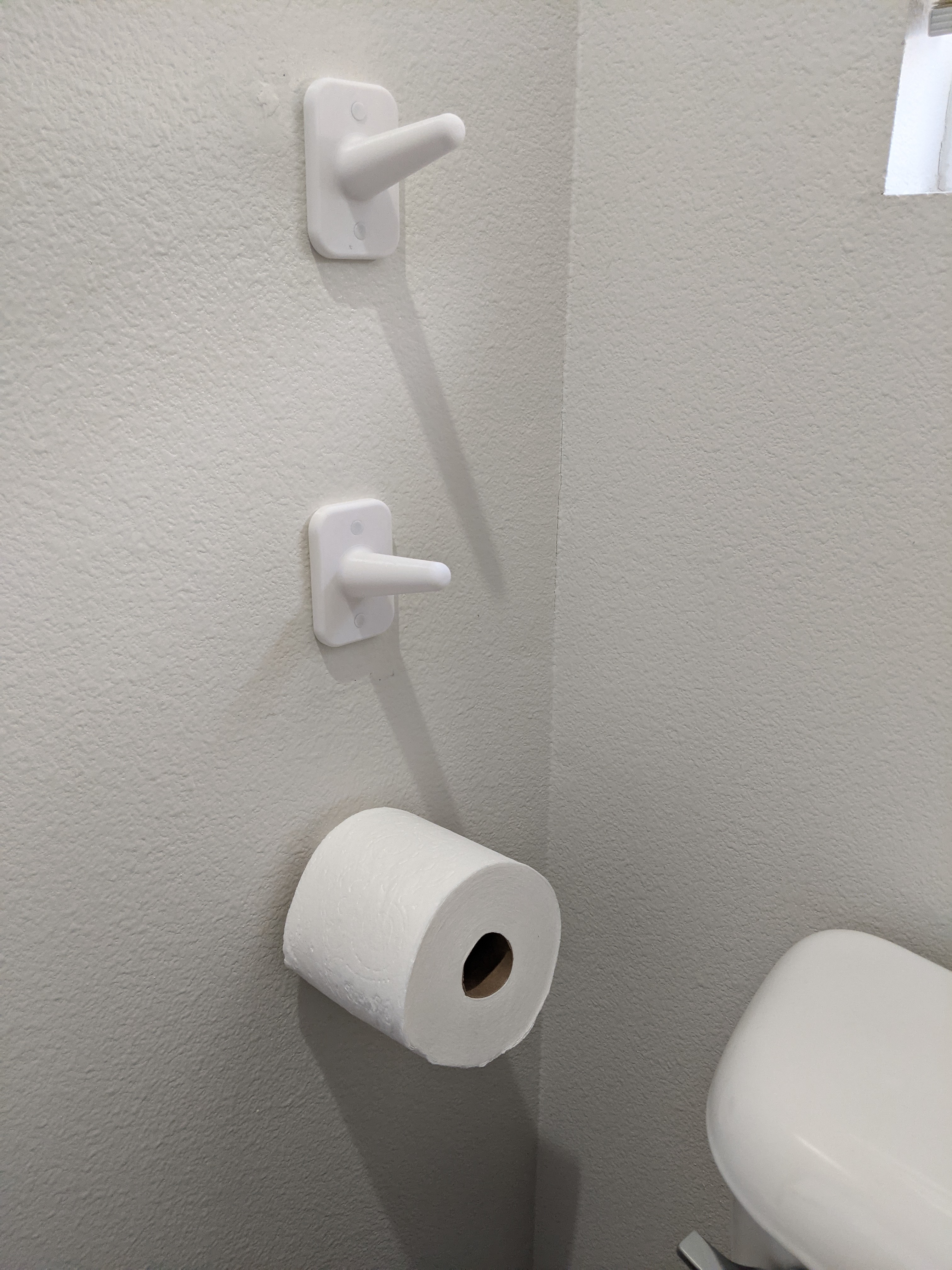 Elegant wall-mounted toilet paper / bogroll holder