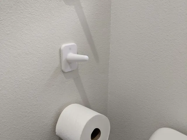 Elegant wall-mounted toilet paper / bogroll holder