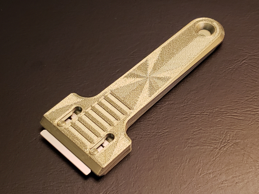 Retractable double-edge razor blade scraper