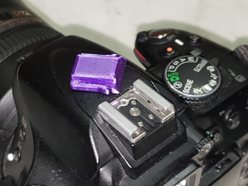Camera hot shoe adapter base / cover