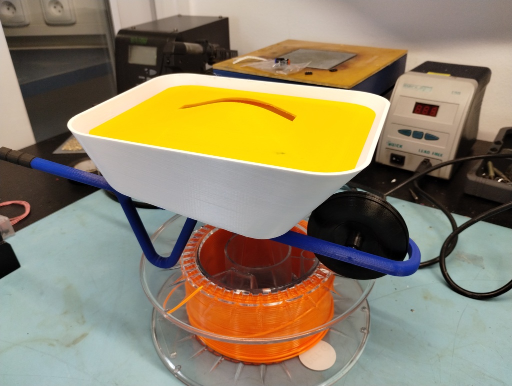 Wheel barrow coin bank