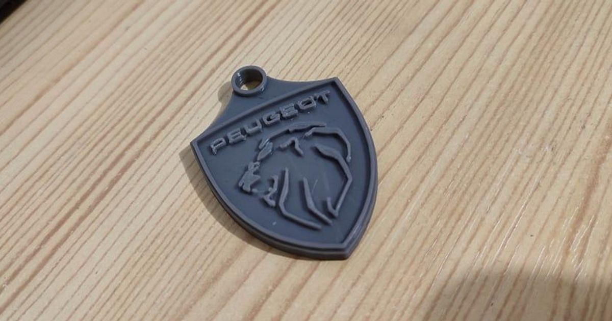 STL file Keychain with Peugeot logo year 80 🗝️・Model to