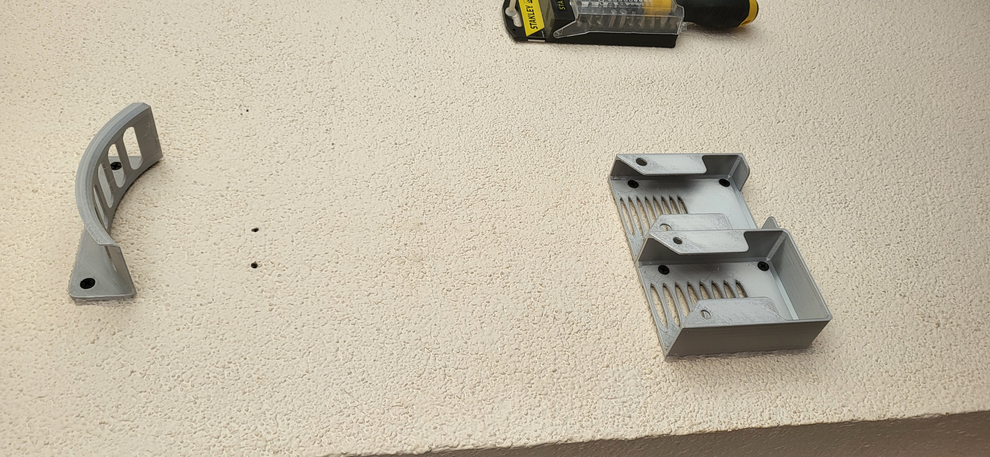 Wall mount for a headlamp gadget
