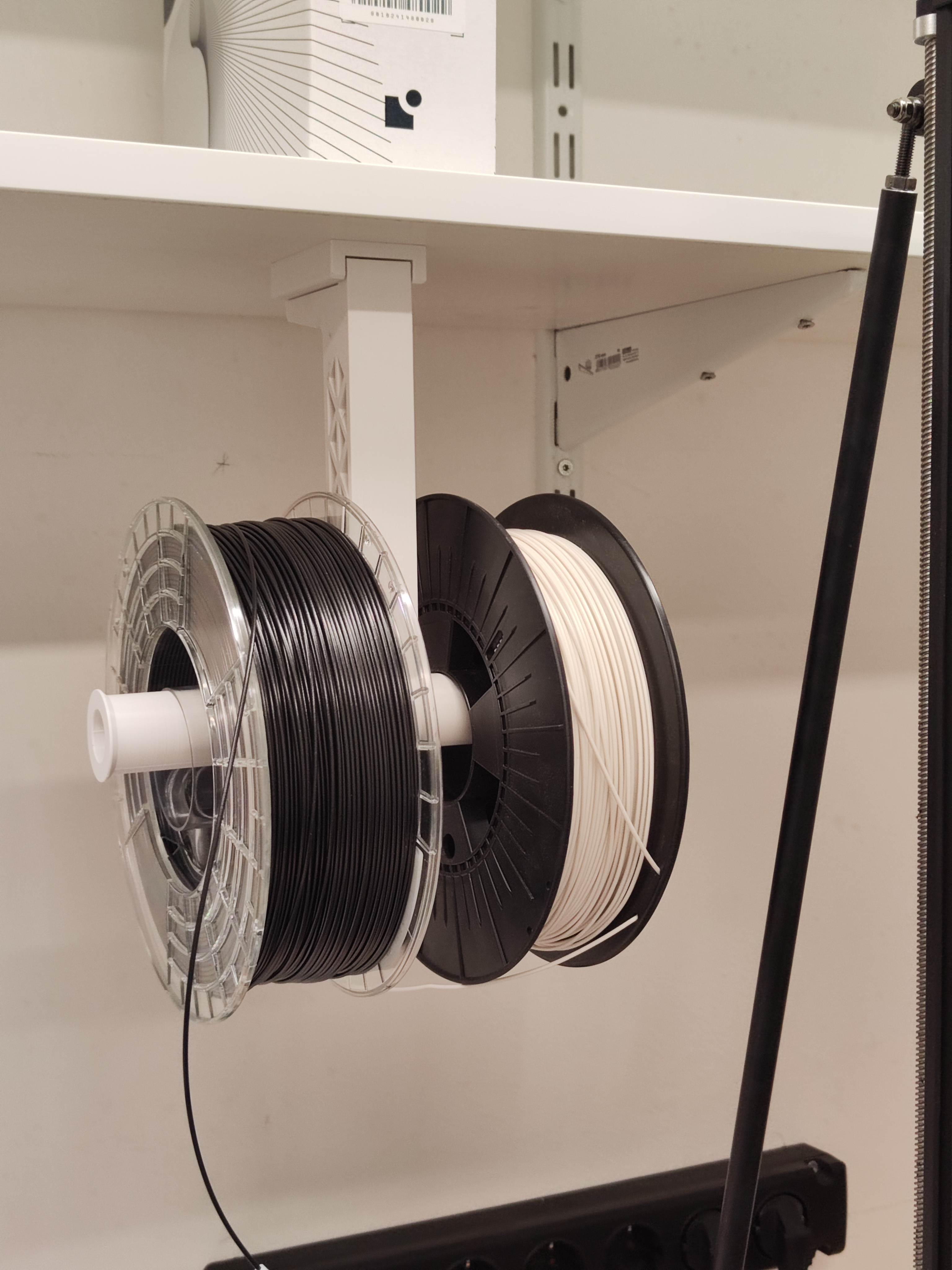 hanging filament spool holder for shelf