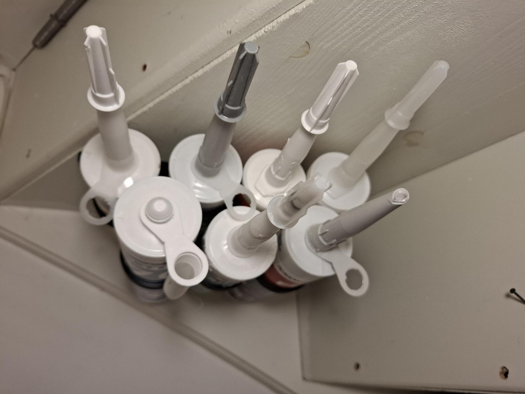 double row caulk under shelf organizer