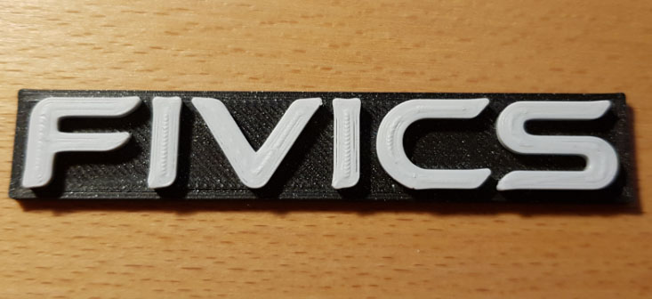 Fivics lettering embossed