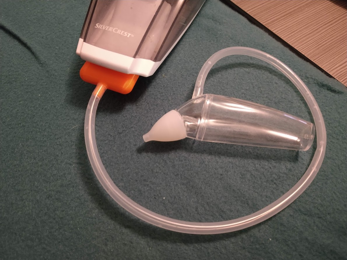 Nasal aspirator adapter for handheld vacuum cleaner