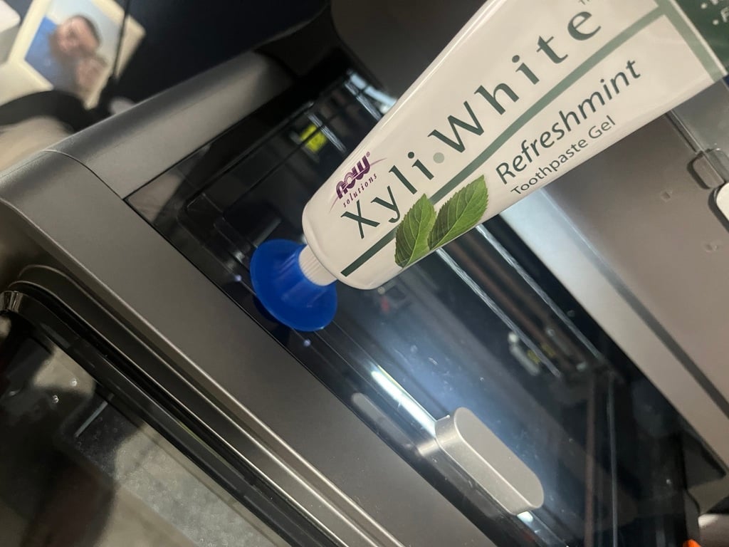 Toothpaste Cap and Stand