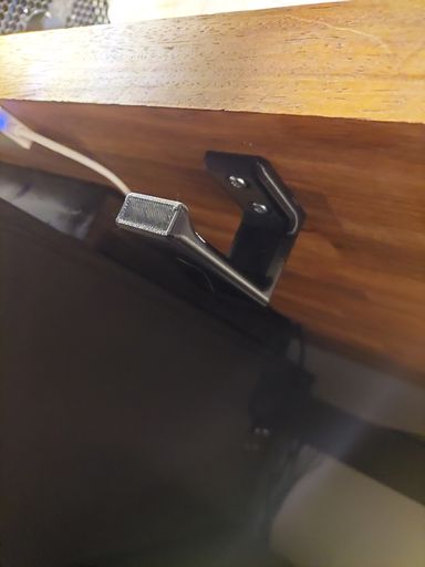 Desk mounted headphone hook