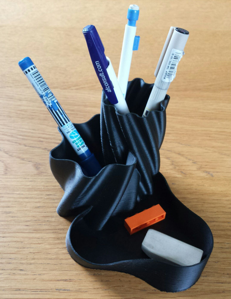 Pen holder with a twist