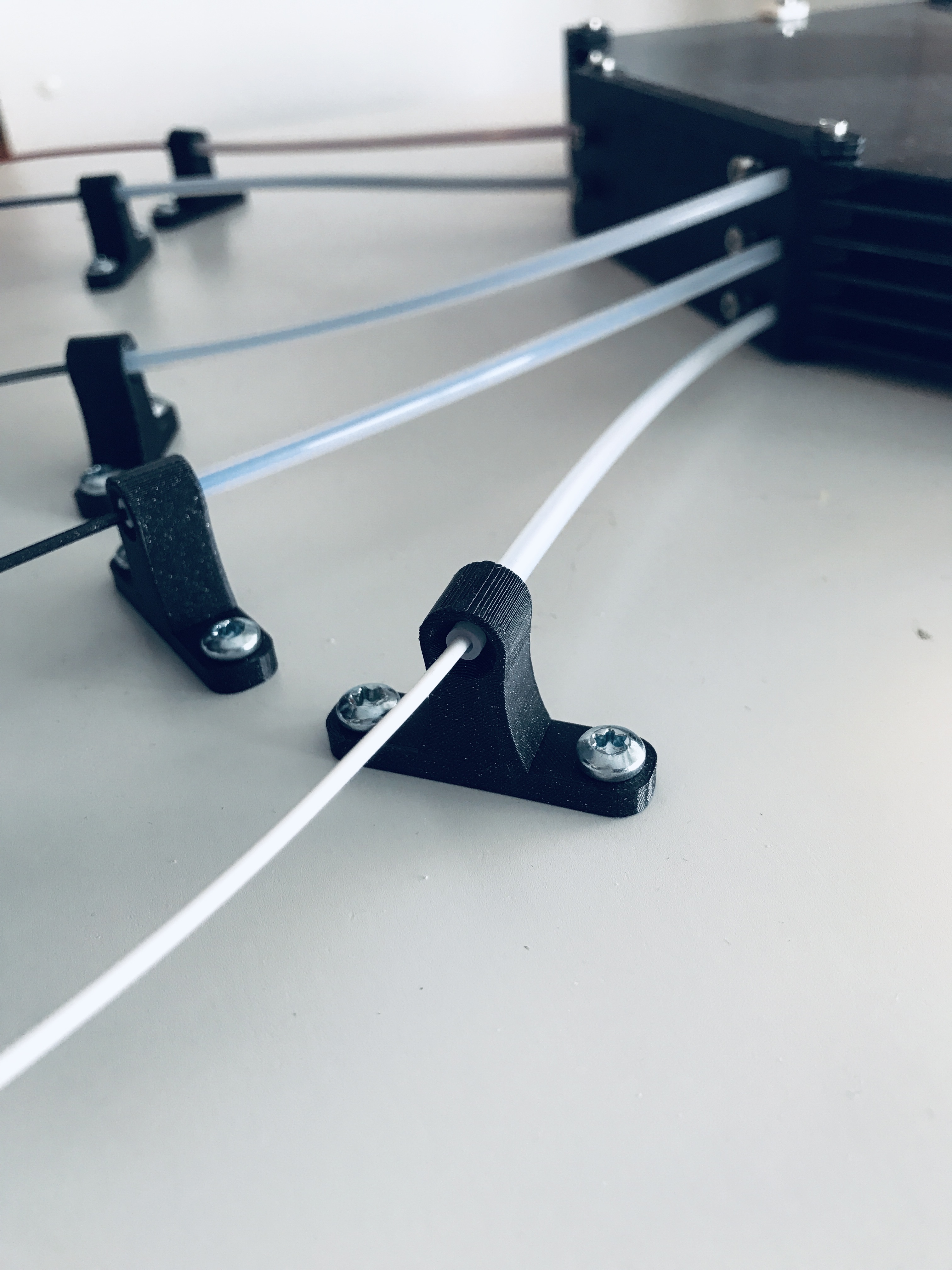 PTFE tube holder