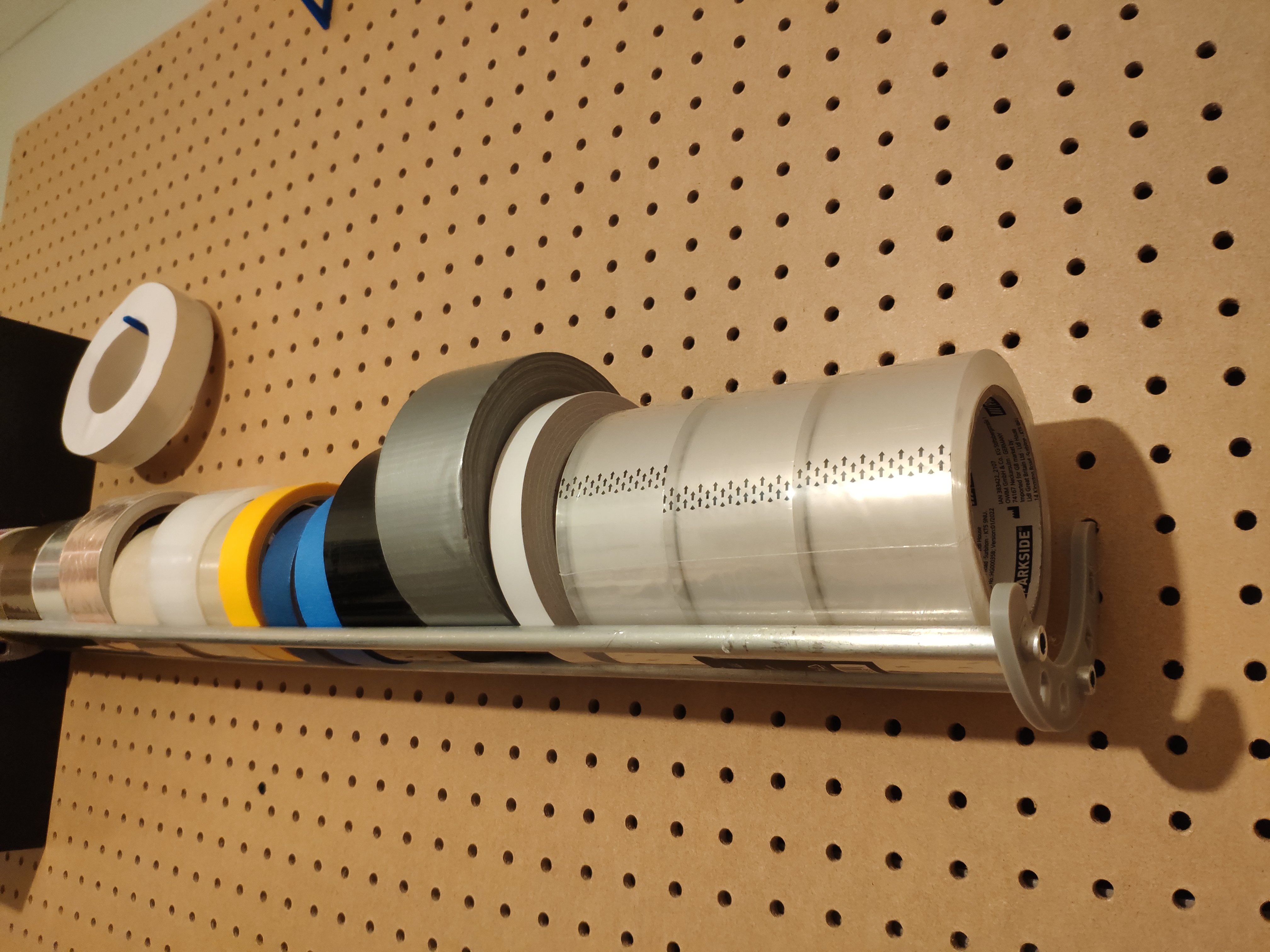 Pegboard tape holder