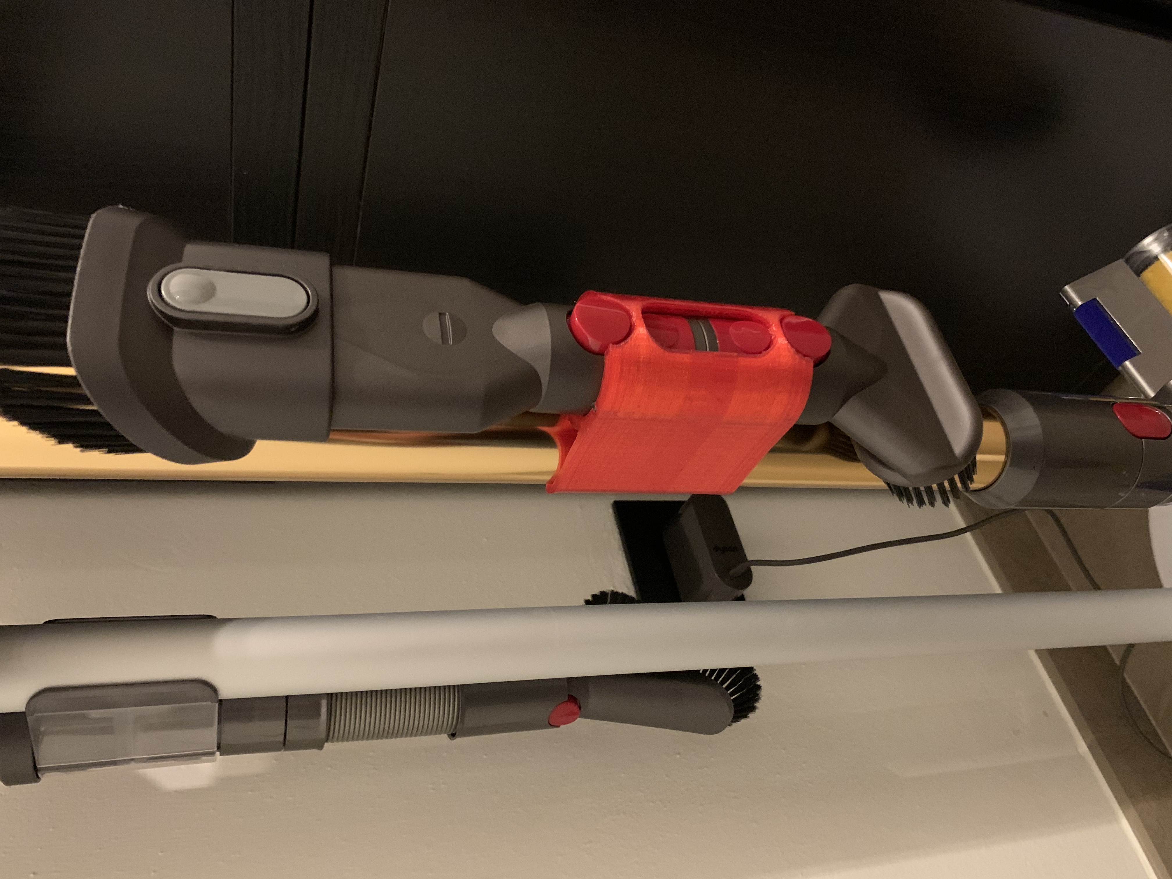 Double dyson accessory holder for extension wand