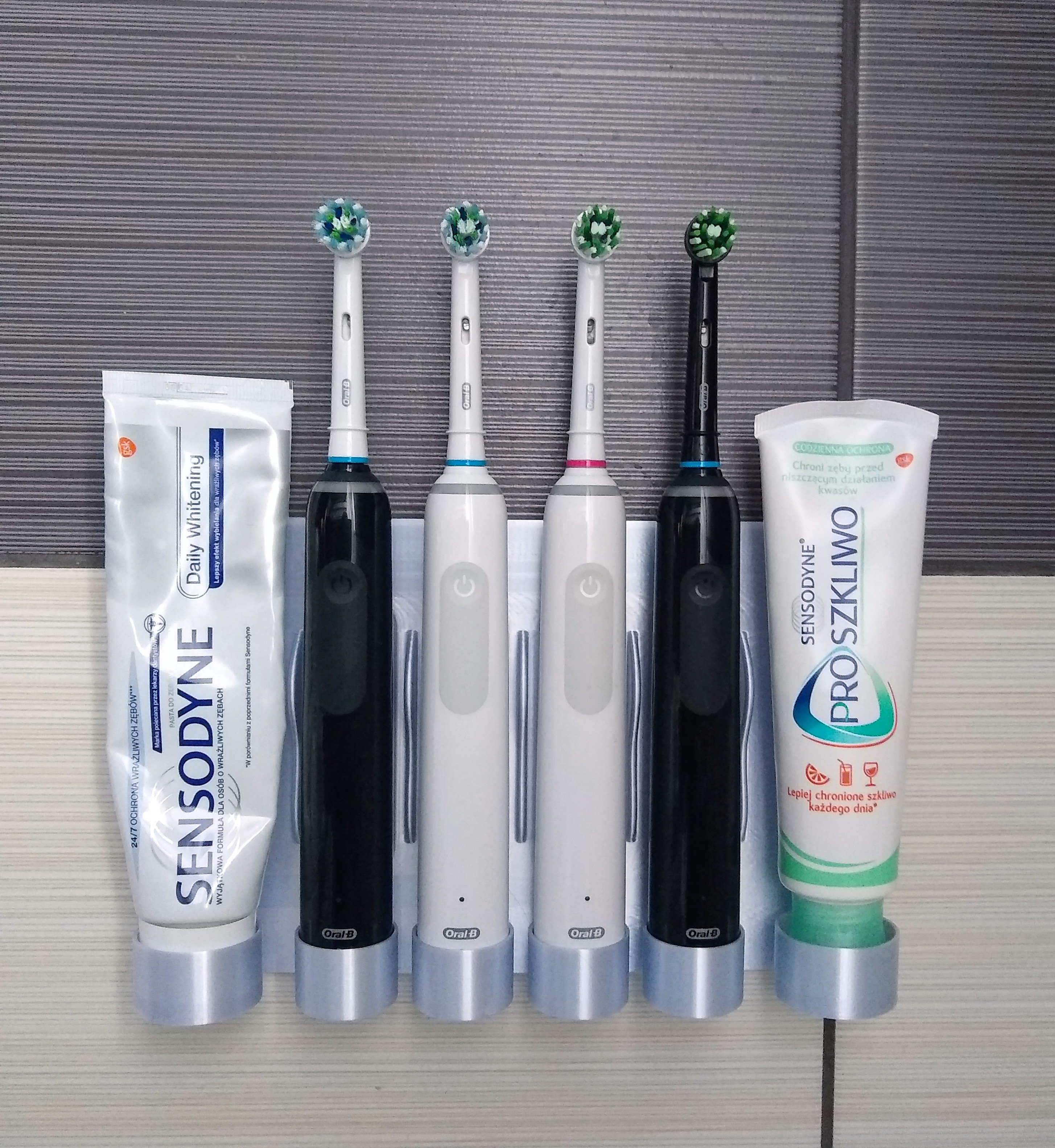Modular wall mount holder electric toothbrush Oral-B and toothpaste