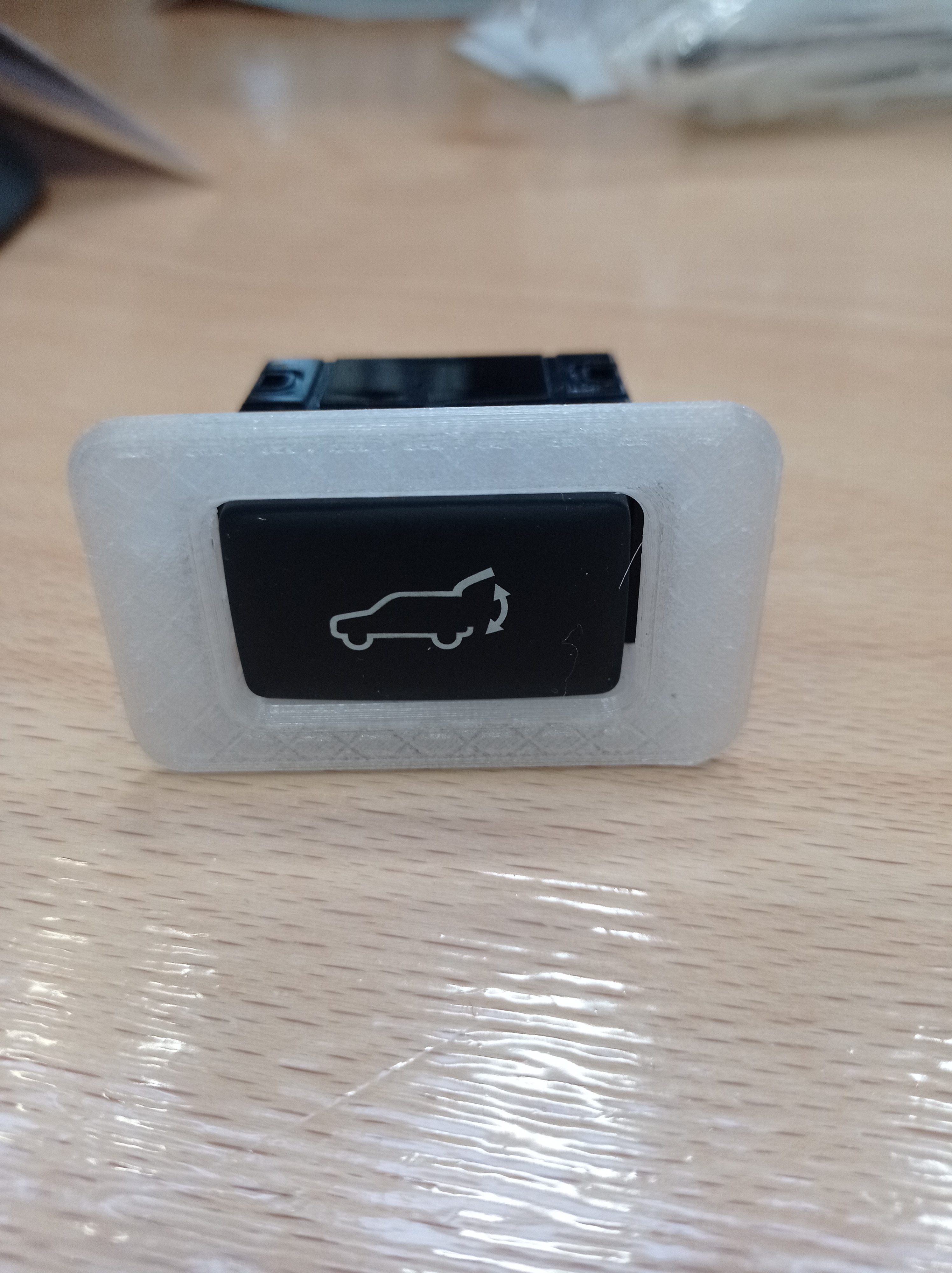 Translucent cover for light switch in the car