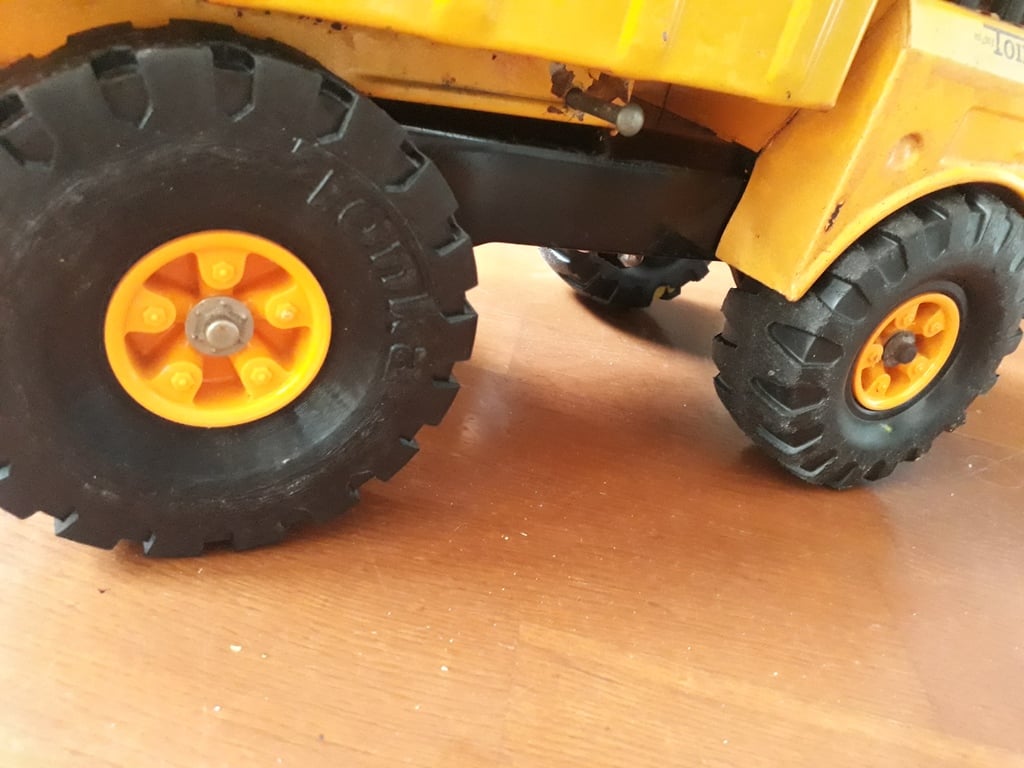 TONKA MIGHTY DUMP TRUCK WHEEL (970 type)