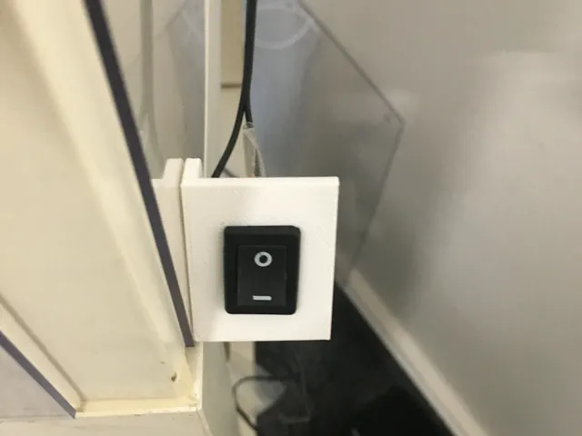 držák vypínače ventilátoru