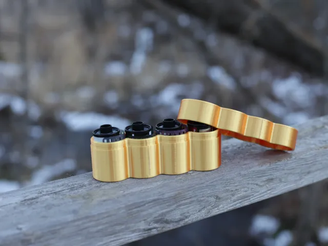 35mm film case- (holds 4 rolls)