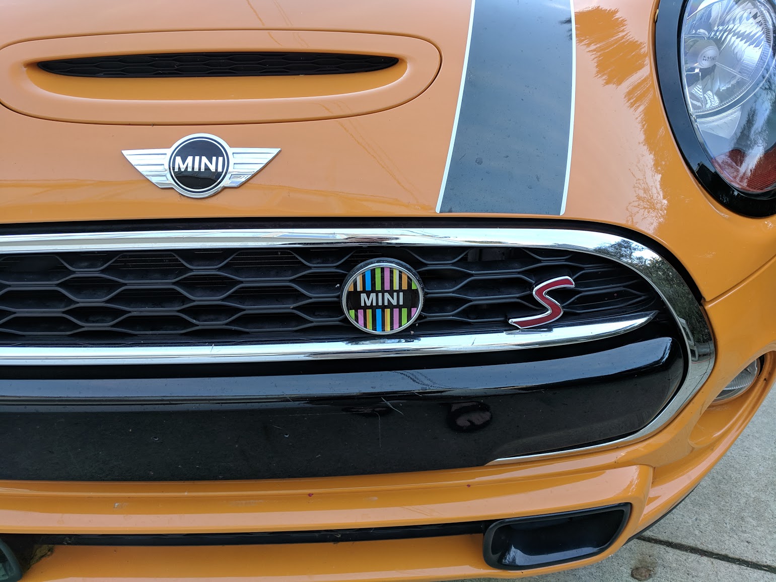 Badge holder for 3rd gen adorable motoring vehicles.