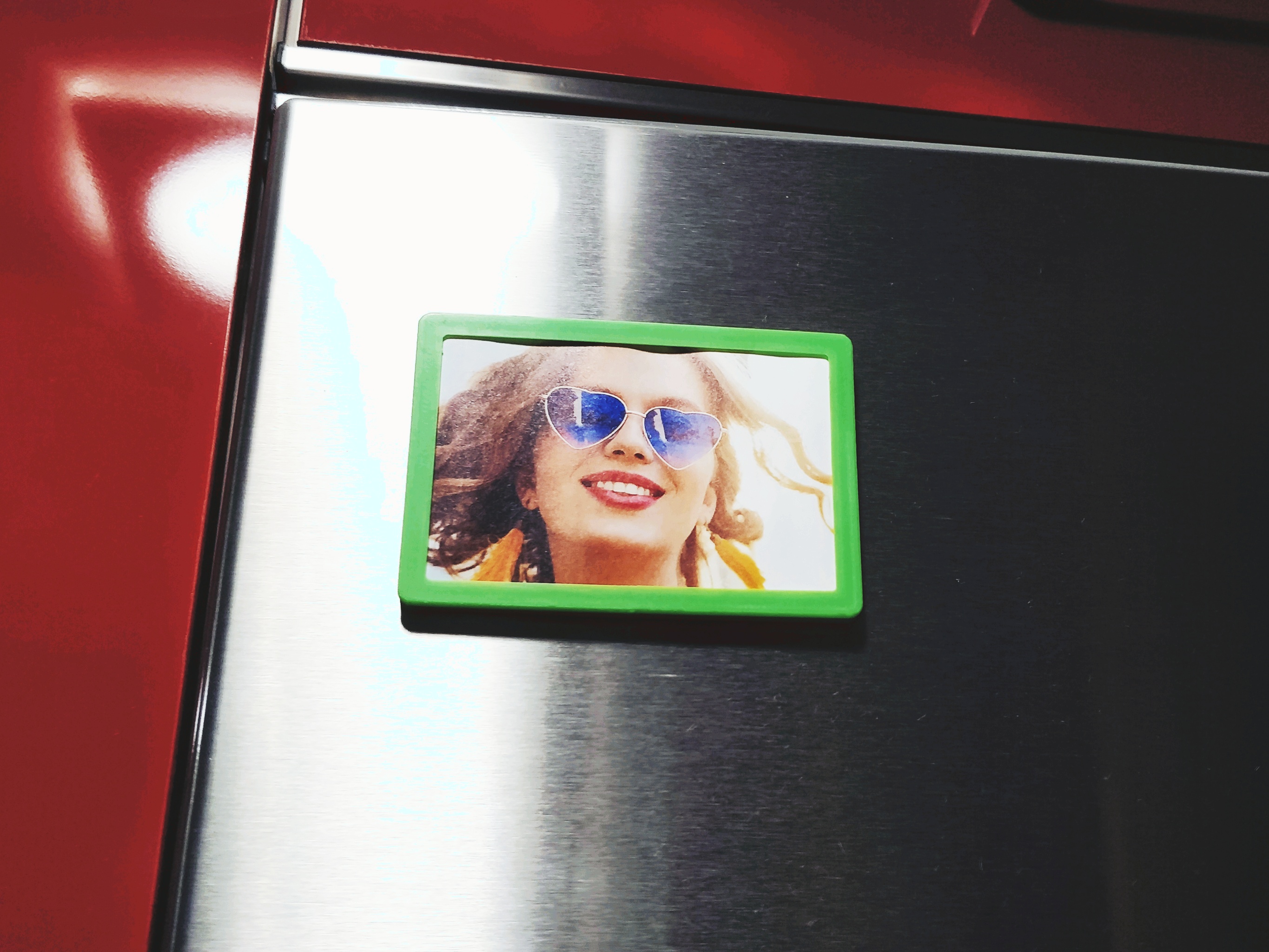 HP Sprocket photo frame and fridge magnet