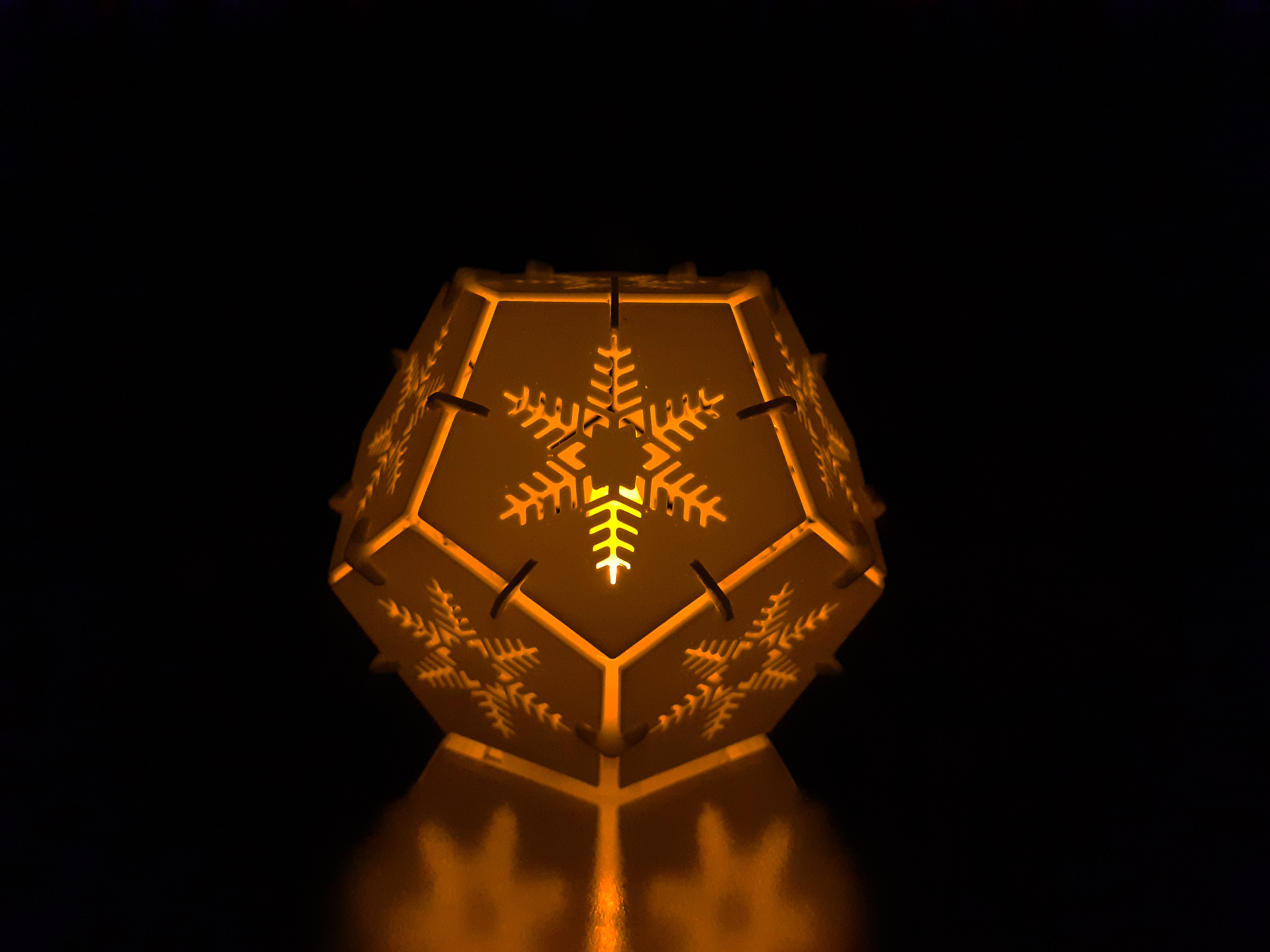 Pentagonal LED tea candle shade with snowflake