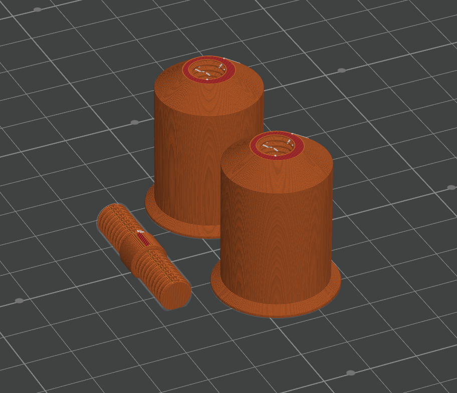 Cereal box roller with headless bolt