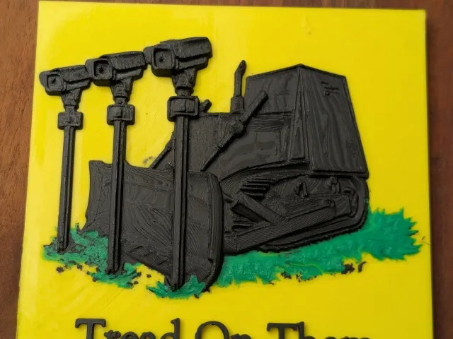 Tread On Them – Killdozer vs. Surveillance Sign