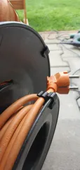 Cable holder on cable reel