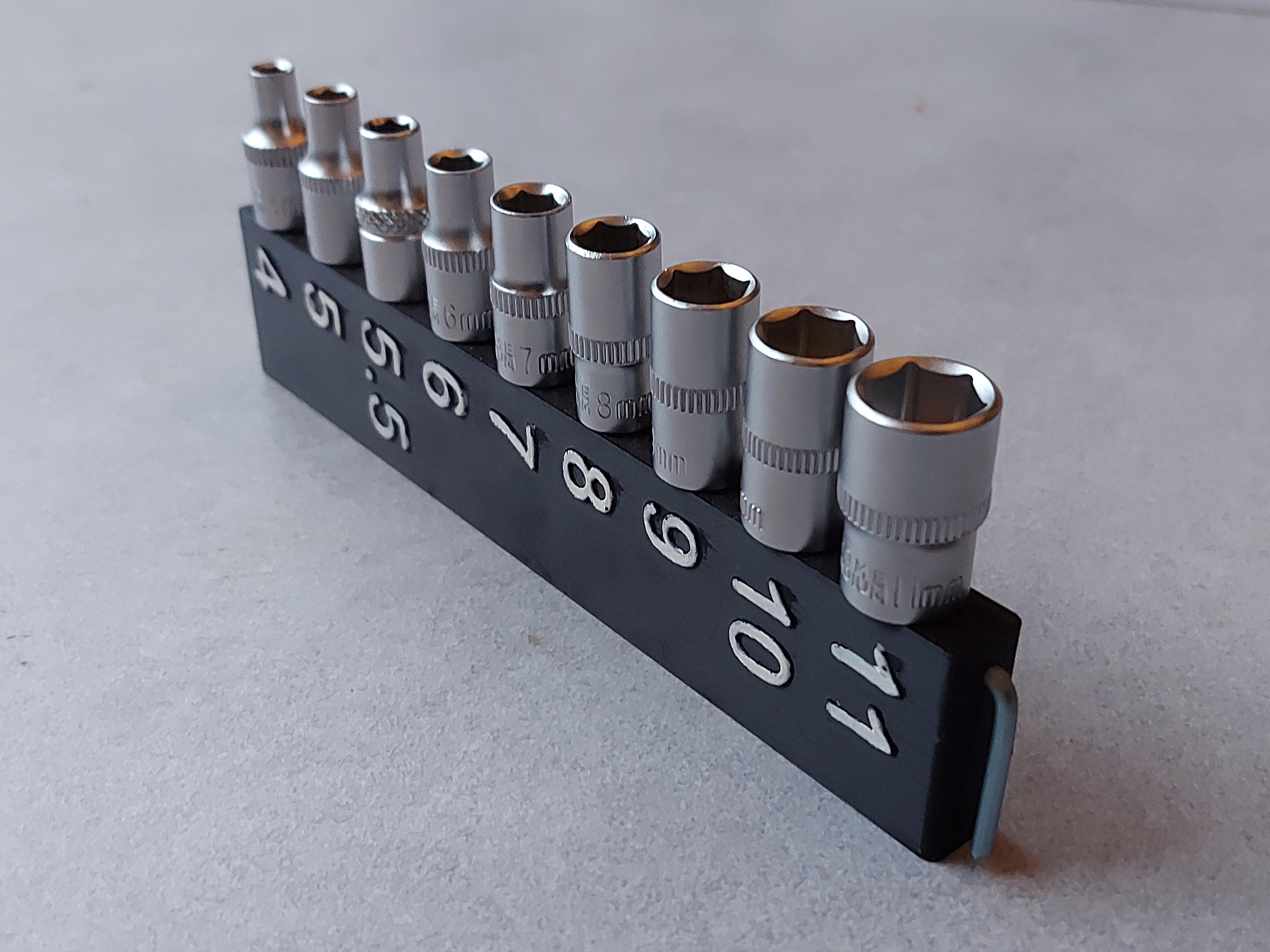 Modular ratchet socket holder for 1/4" square sockets. Replaceable springs. — miniatura 5