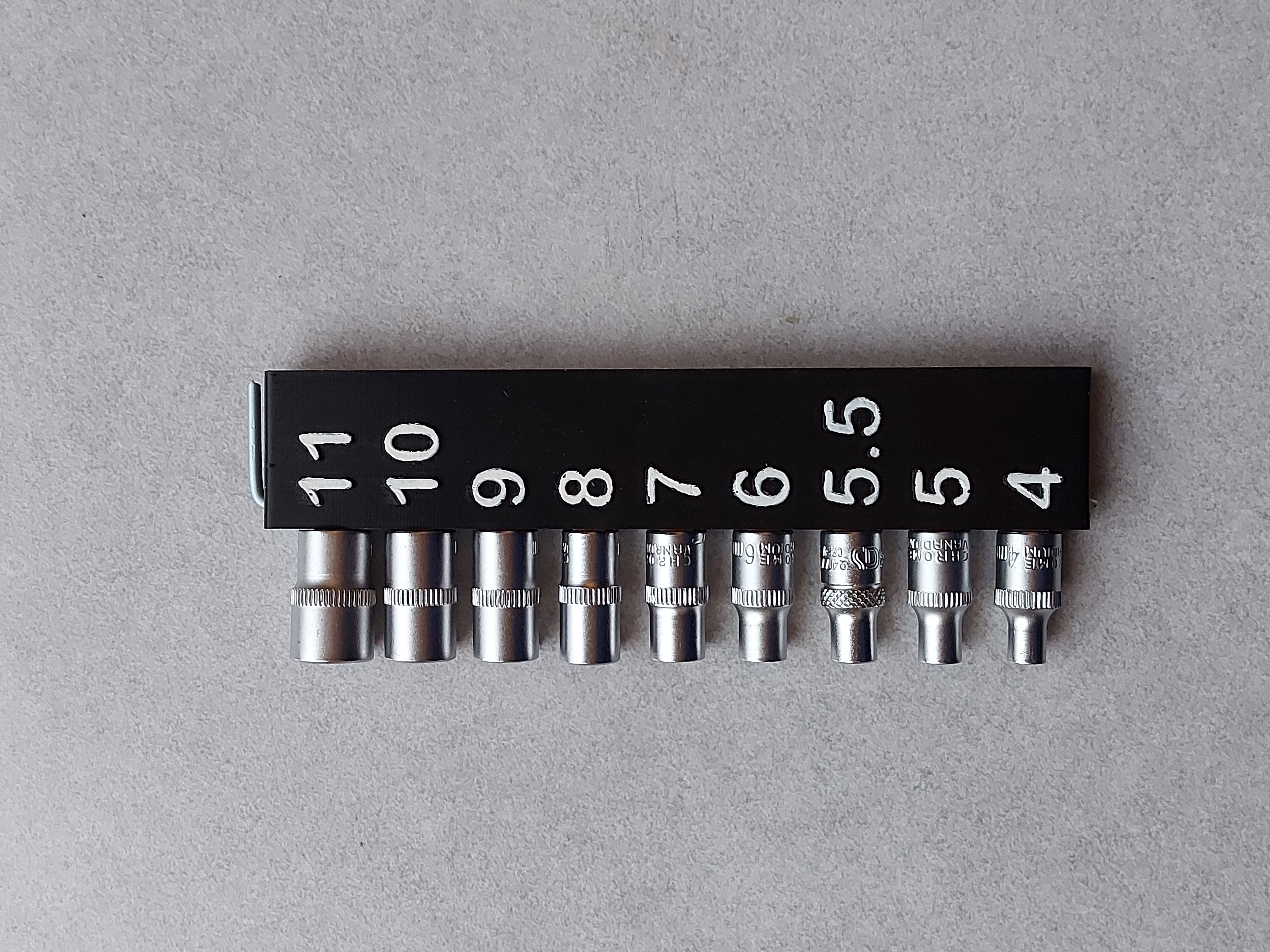 Modular ratchet socket holder for 1/4" square sockets. Replaceable springs. — miniatura 2