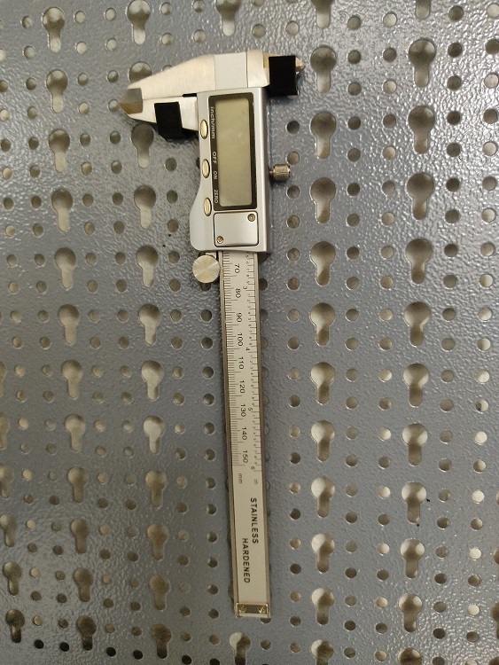 Küpper board caliper holder