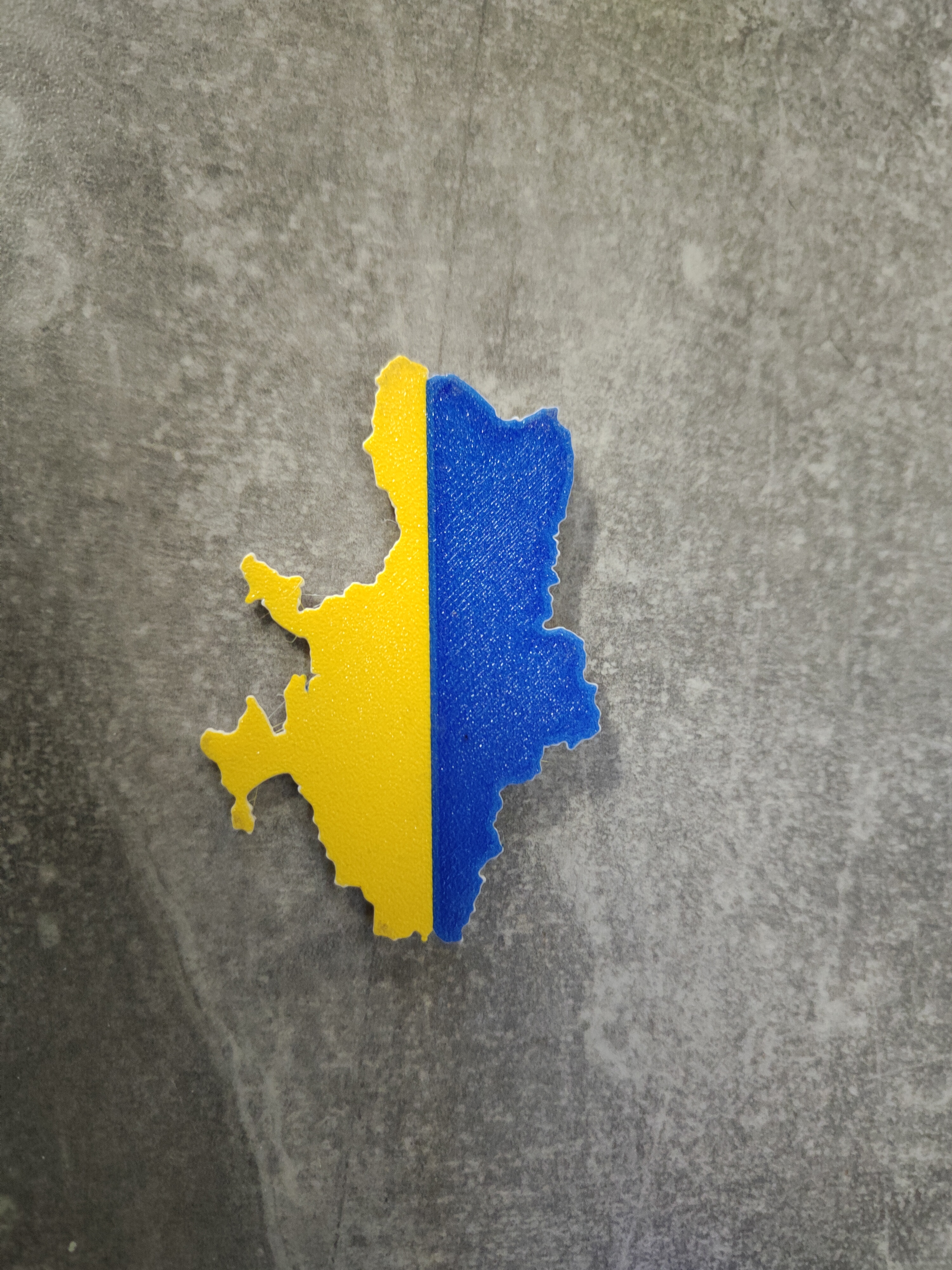 High detailed single-nozzle multicolor badge in the shape of Ukraine