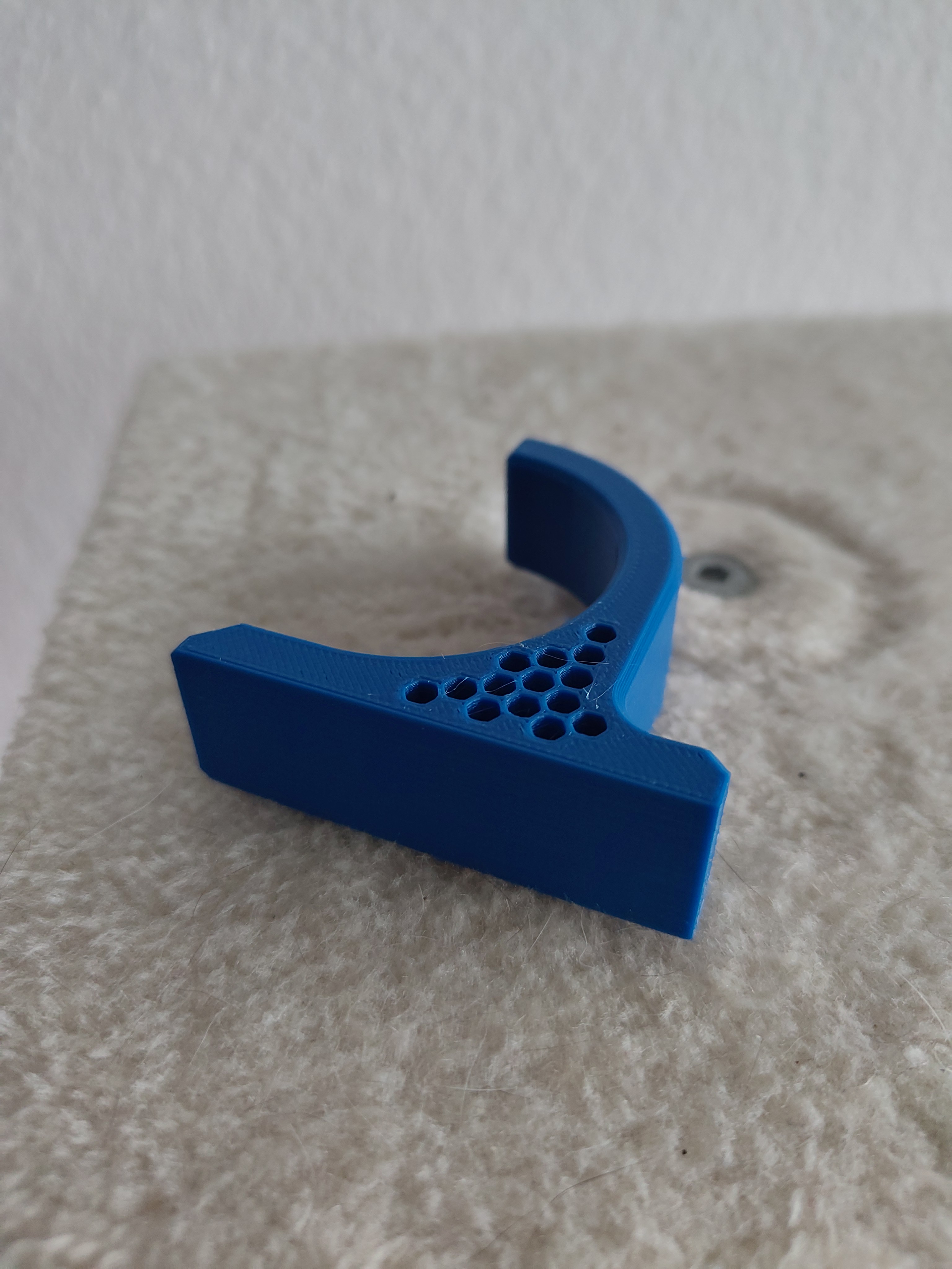 circular hook with flat mounting point.