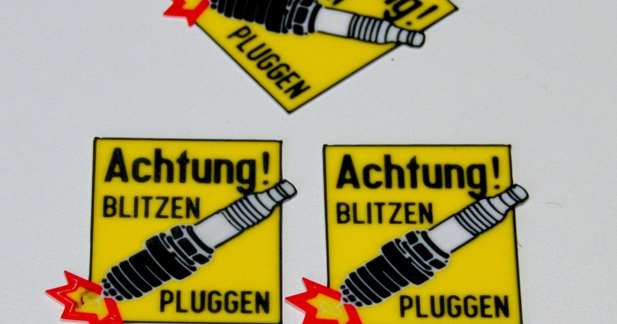 Spark plug warning sign for 2stroke and petrol engine applications