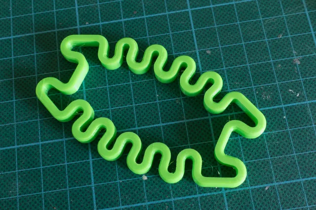 Squished Bug Earphone Holder - springy