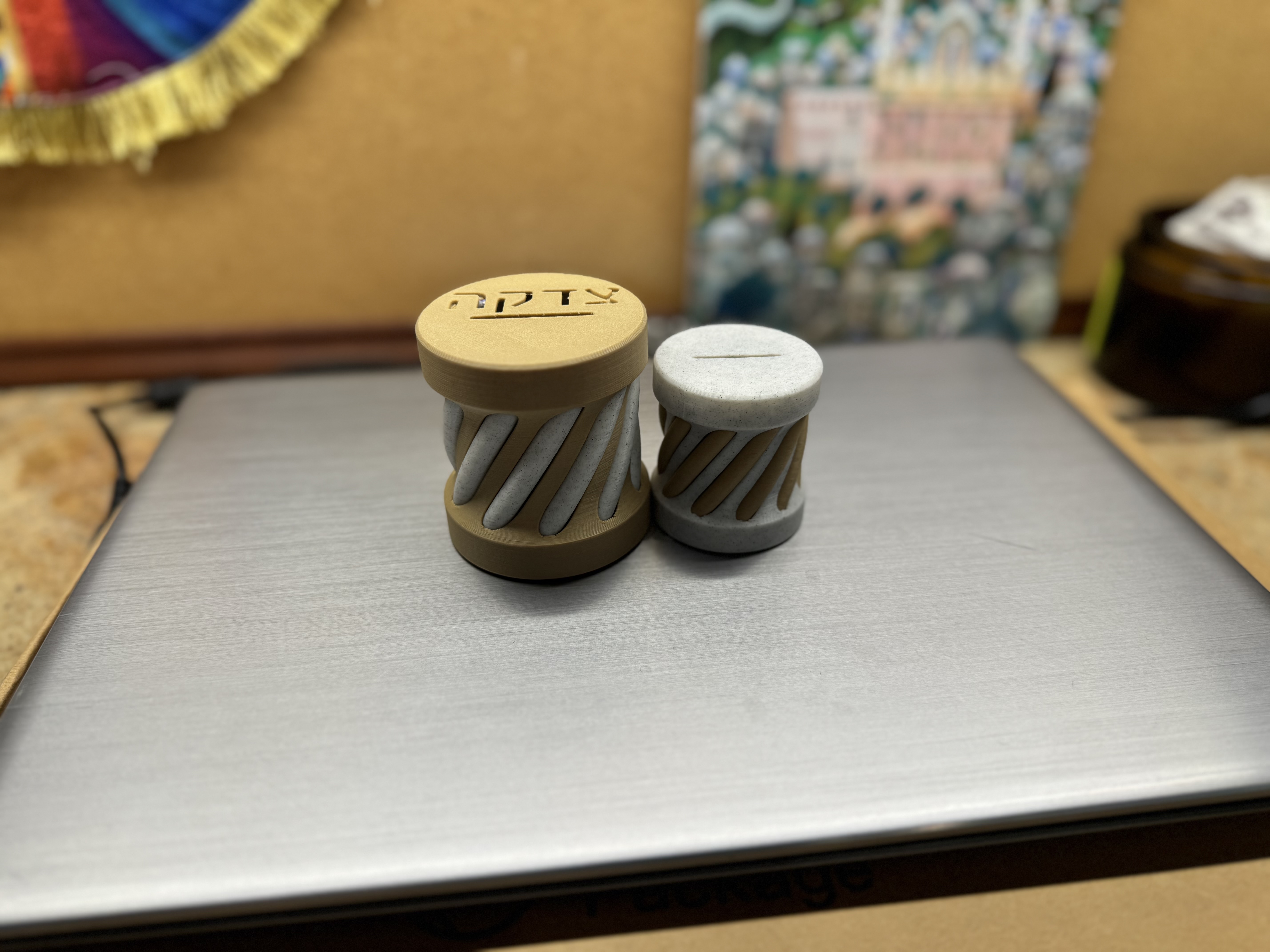 twist pushkah/tzedakah box with a tricky click lock