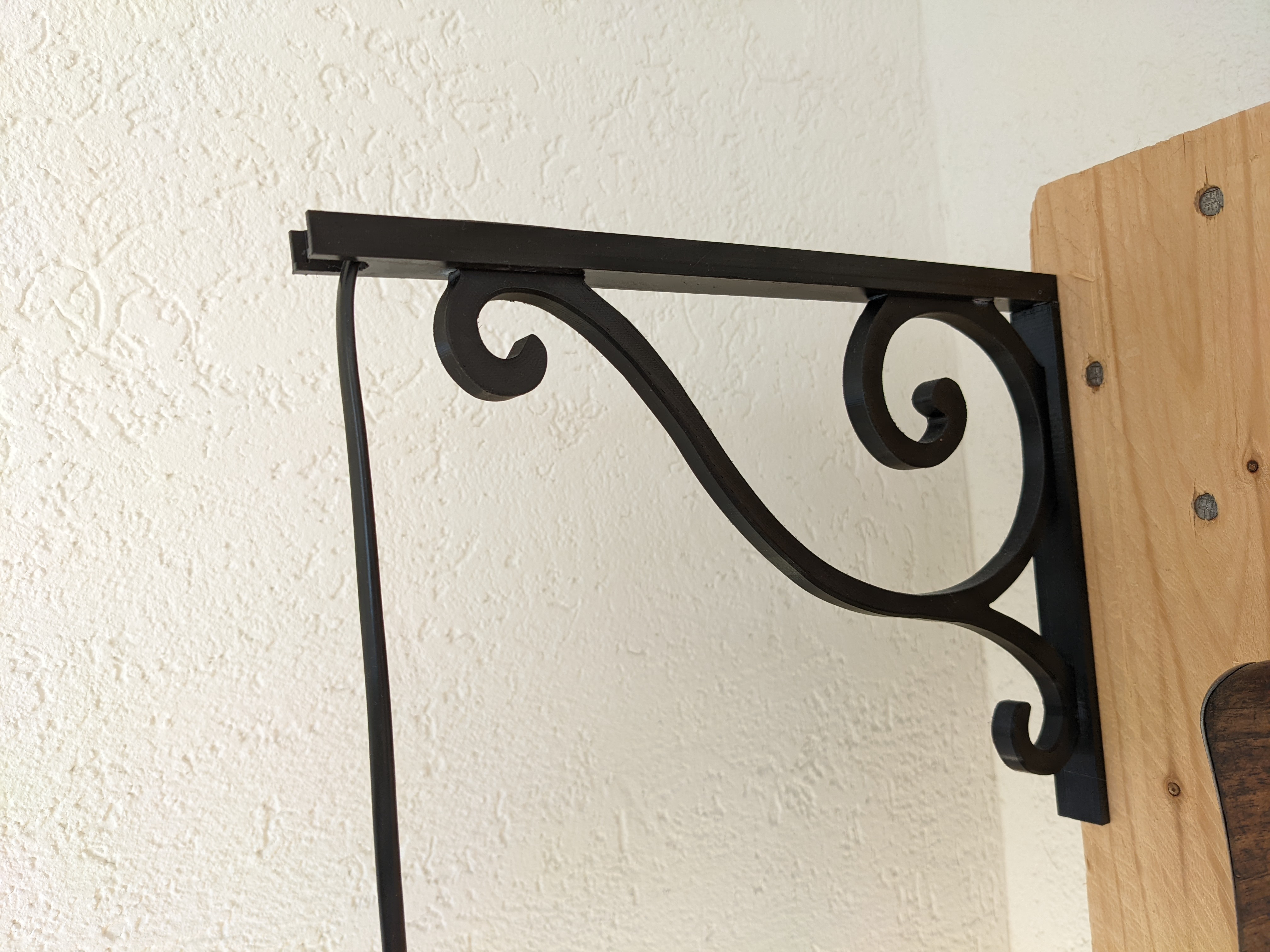 Lamp holder twirl bracket