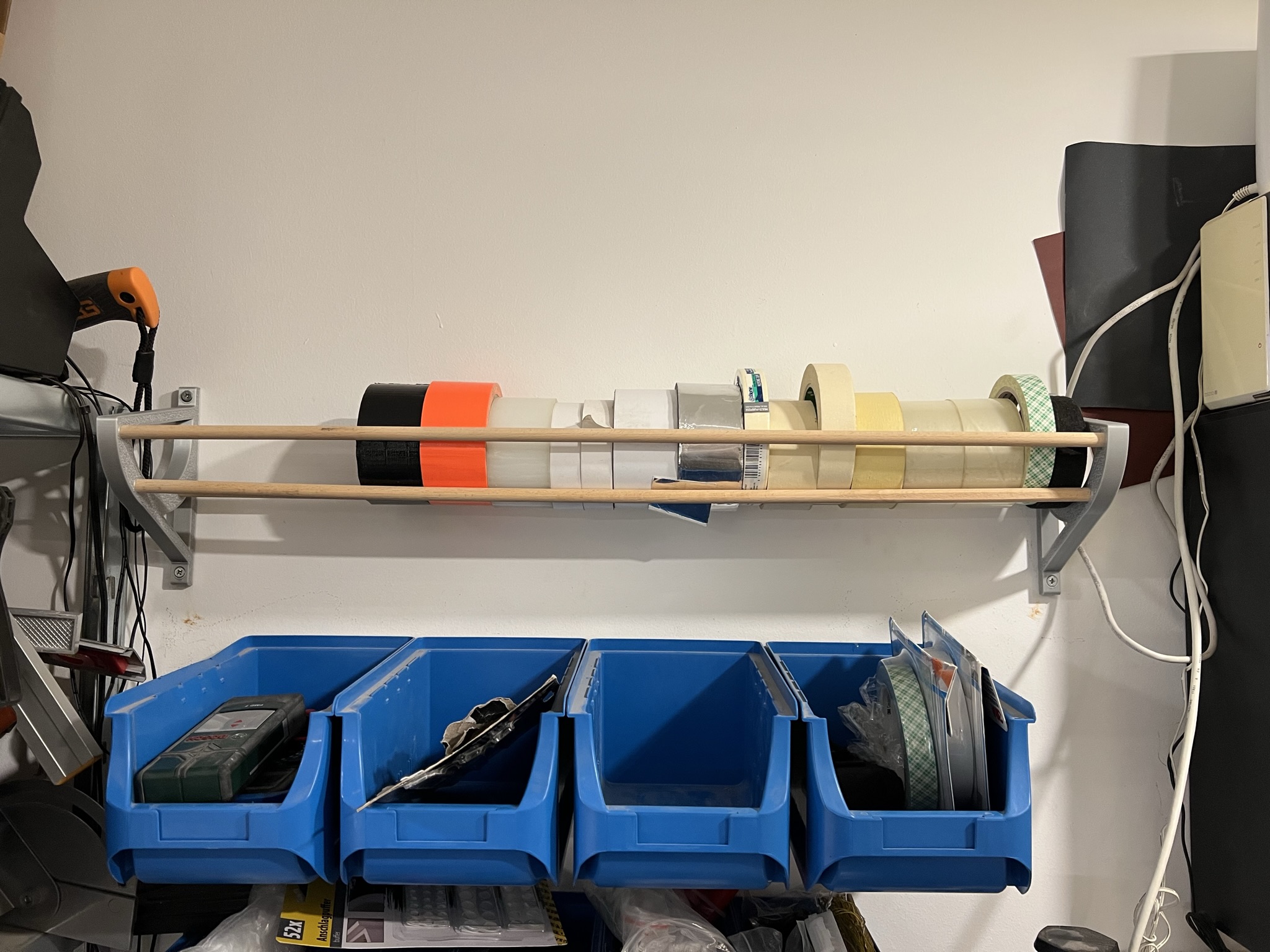 Tape holder and organizer shelf