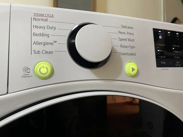 LG washing machine Power and Play buttons