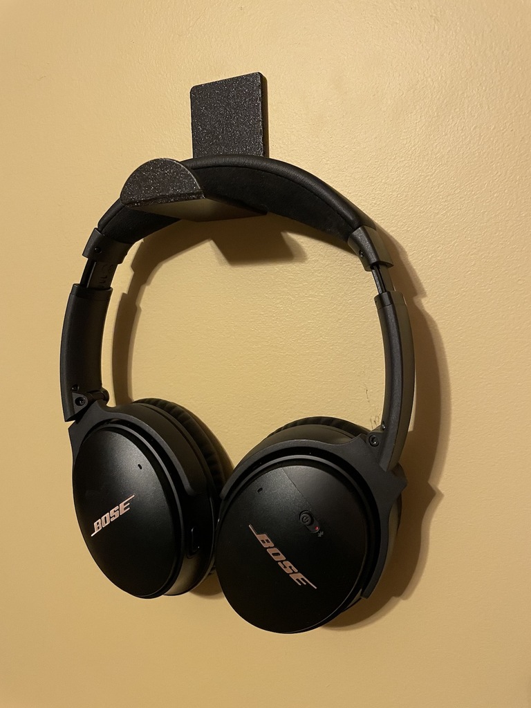 Wall-mounted headphone hanger