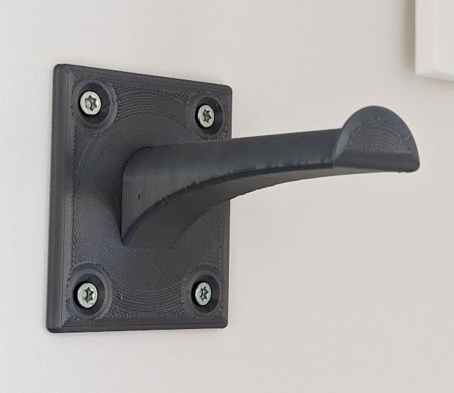 Wall mounted filament spool holder