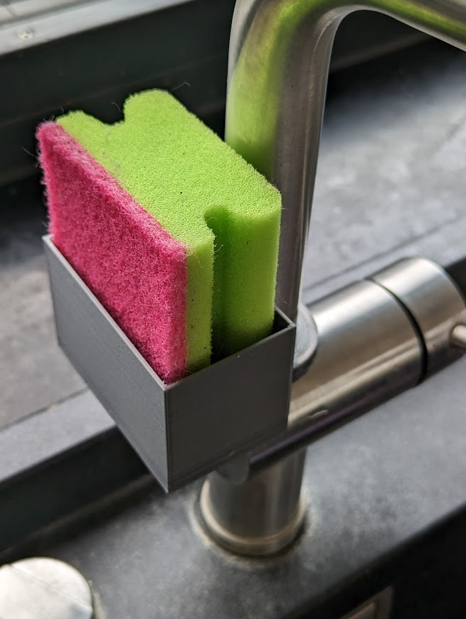Kitchen sink sponge holder